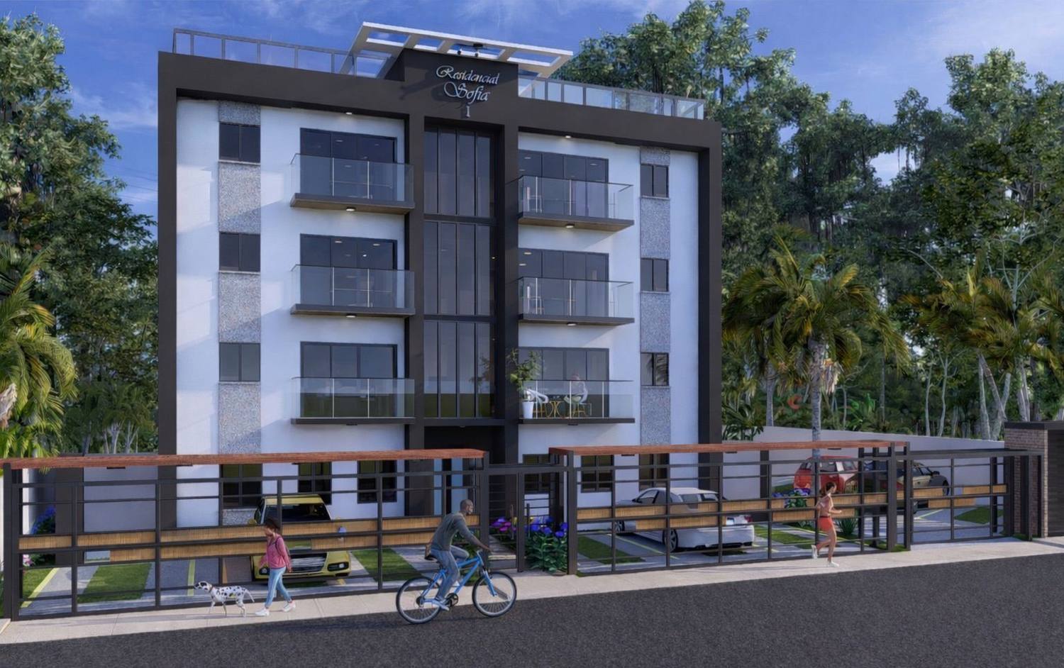 Fachada de Residencias Sofía I de día, con balcones de vidrio y vegetación tropical alrededor
